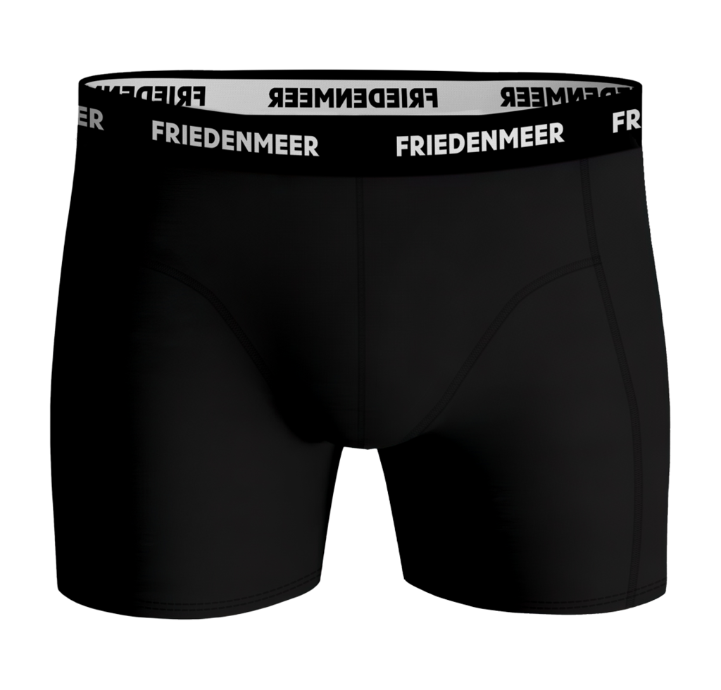 The image depicts the upper body of an athletic man showcasing and wearing the black boxer shorts by FRIEDENMEER, featuring a white 'FRIEDENMEER' text design on a black waistband, showcased and presented.